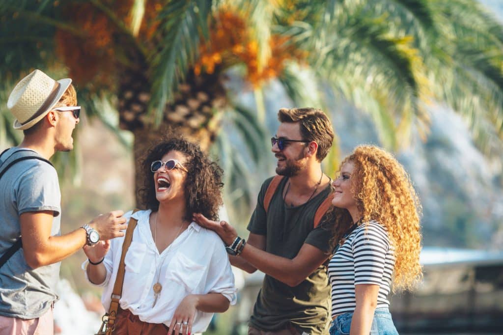 Two Couples Having Fun On Summer Vacation